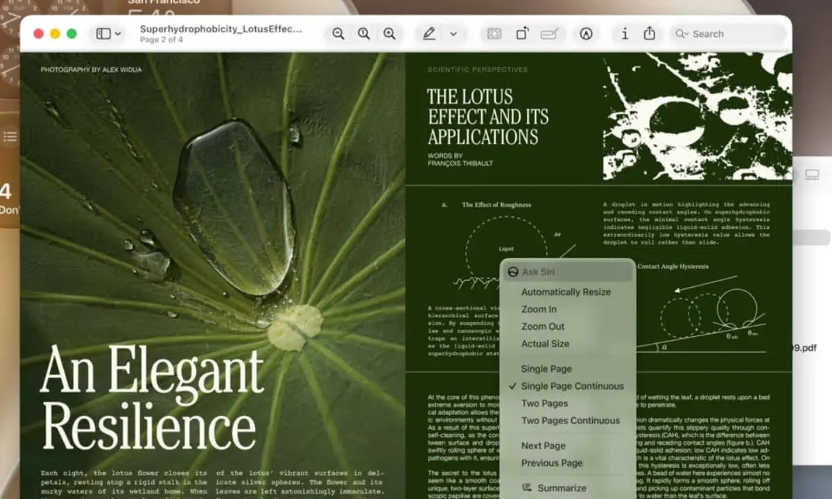 Una gran hoja de loto (objeto) que muestra gotas de agua que se deslizan sobre ella (acción) frente a una doble página de revista de color verde oscuro en la pantalla de un ordenador (contexto).  Texto transcrito (todo el texto legible en la imagen): - Título de la ventana: Superhidrofobicidad_Efecto Loto... Página 2 de 4 - Arriba a la izquierda (texto pequeño): FOTOGRAFÍA DE ALEX WIDUA - Título grande a la izquierda: Una elegante resiliencia - Título de la columna derecha: EL EFECTO LOTO Y SUS APLICACIONES - Autor de la columna derecha: TEXTO DE FRANÇOIS THIBAULT - Título pequeño a la derecha (semilegible): PERSPECTIVA CIENTÍFICA - Menú en pantalla (centrado): Preguntar a Siri  - Cambiar tamaño automáticamente  - Acercar  - Alejar  - Tamaño real - Una página - Una página continua - Dos páginas  - Dos páginas continuas - Página siguiente  - Página anterior  - Resumir  El resto del texto y la letra pequeña están presentes, pero son demasiado pequeños o borrosos para transcribirlos con precisión.